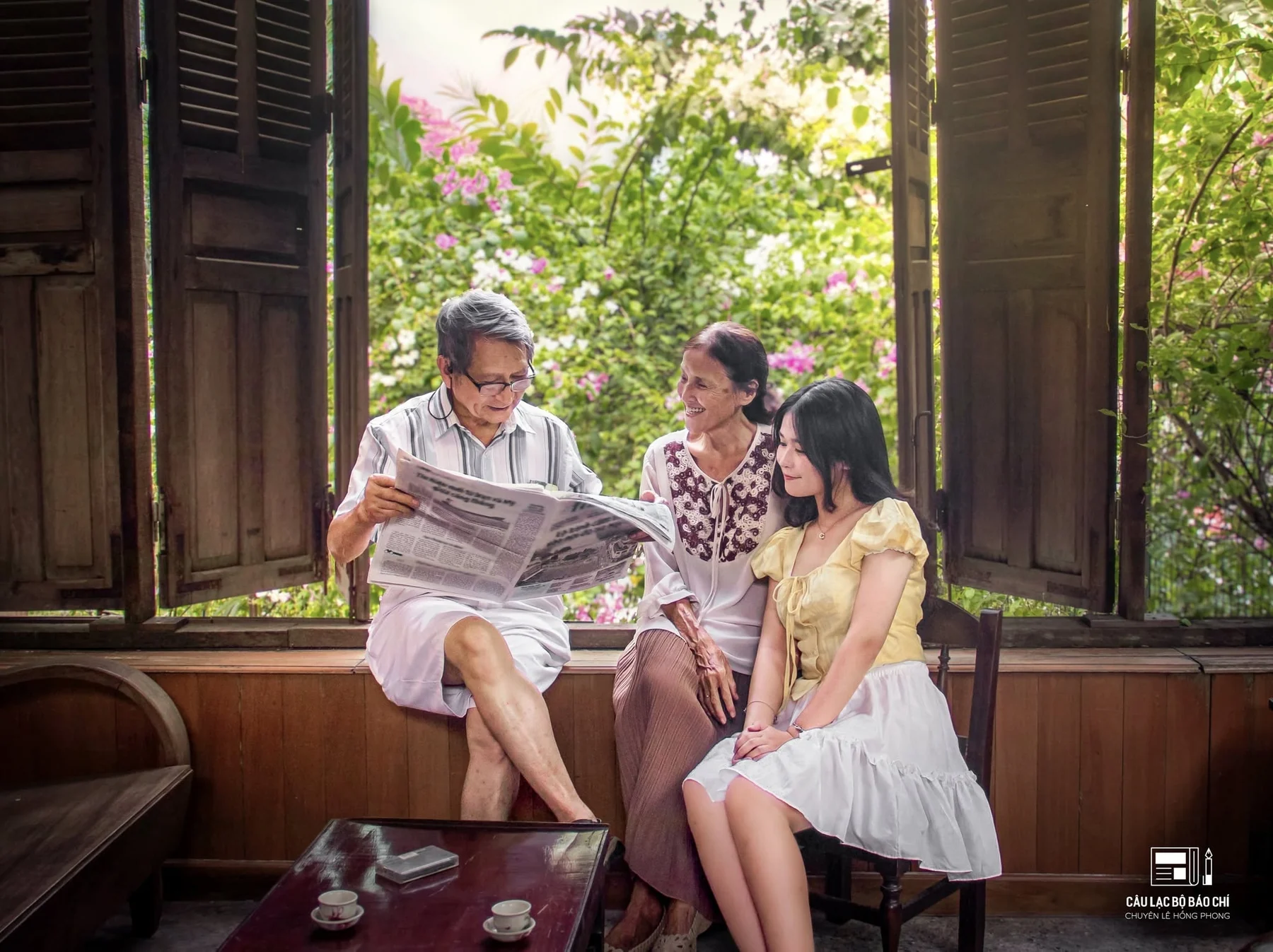 An intergenerational moment by an open window